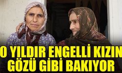 Çivril’de fedakar anne Teslime Özdemir, engelli kızına 50 yıldır özenle