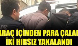 Çivril’de araç içinde bulunan parayı çalan iki hırsız, polis tarafından