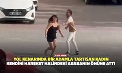 Yol Kenarında Bir Adamla Tartışan Kadın, Kendini Hareket Halindeki Arabanın Önüne Attı